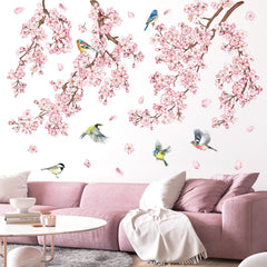 Decalmile pink flower vine wall sticker creates a soft, whimsical bedroom backdrop.