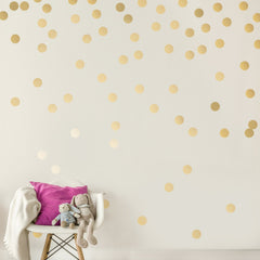 Decals for the Wall gold dots 2-inch wall decal adds a subtle metallic accent.