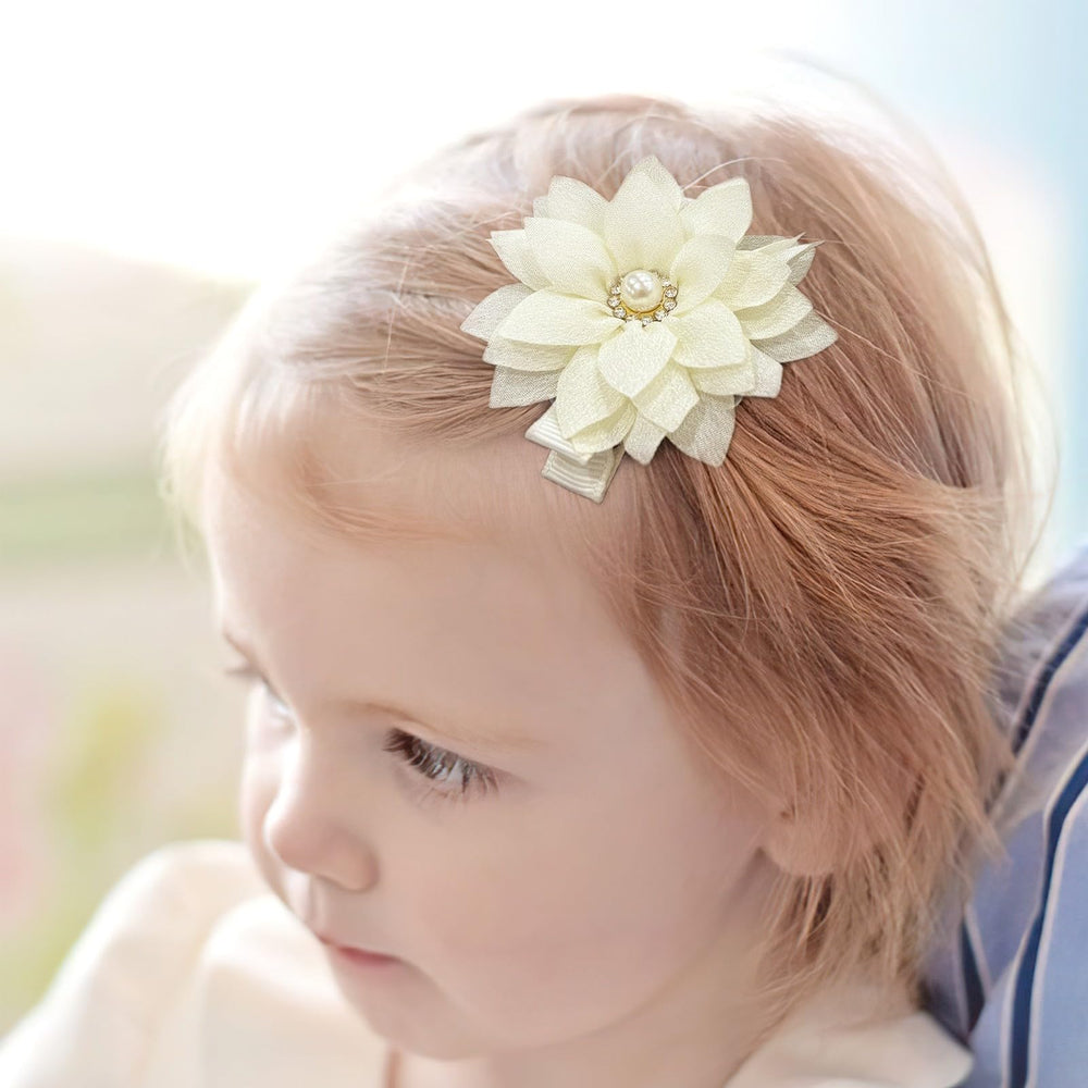DED baby hair clips securely hold fine and thick hair during play.