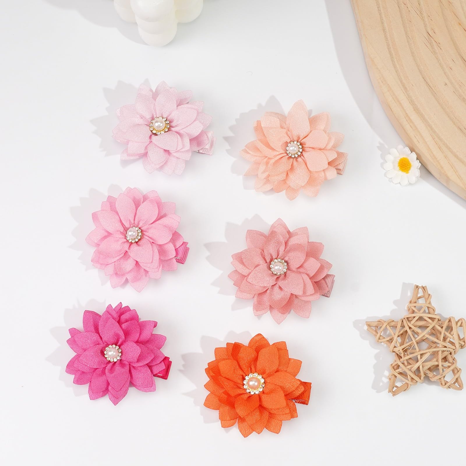 DED chiffon and grosgrain craftsmanship creates delicate, eye-catching accessories.