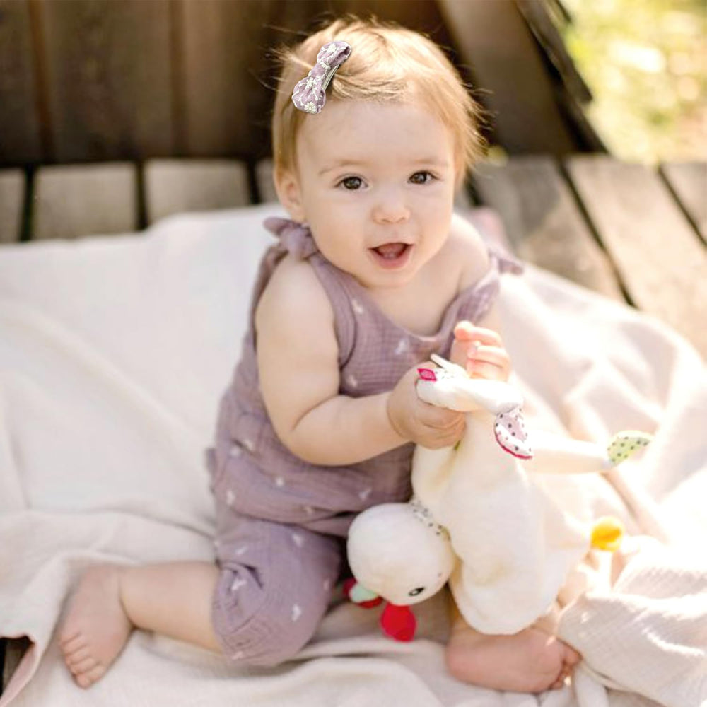 DED soft-edged handcrafted bows prevent irritation on delicate scalps