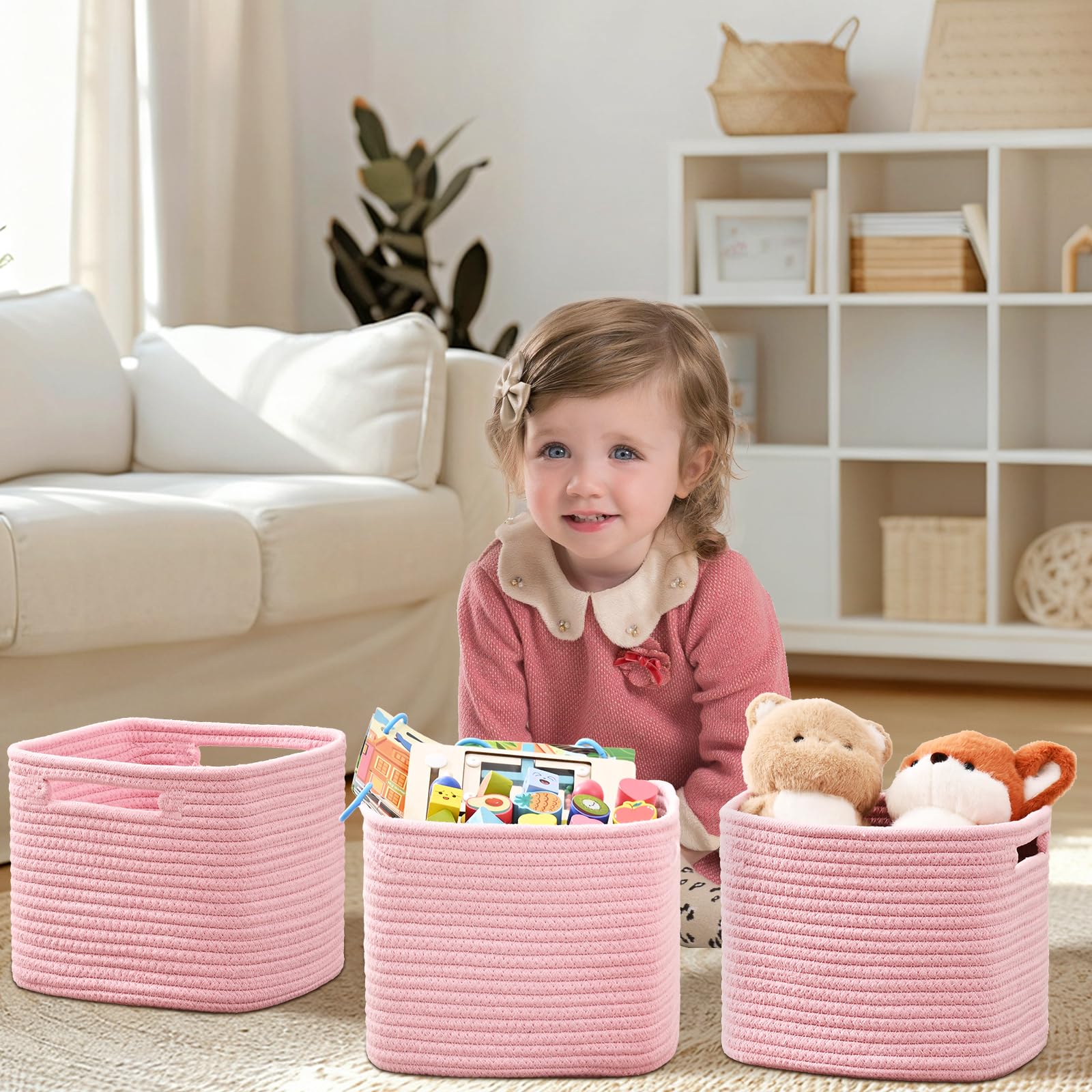 Degeyoyo pink cube storage bin used for folded clothes in a closet.