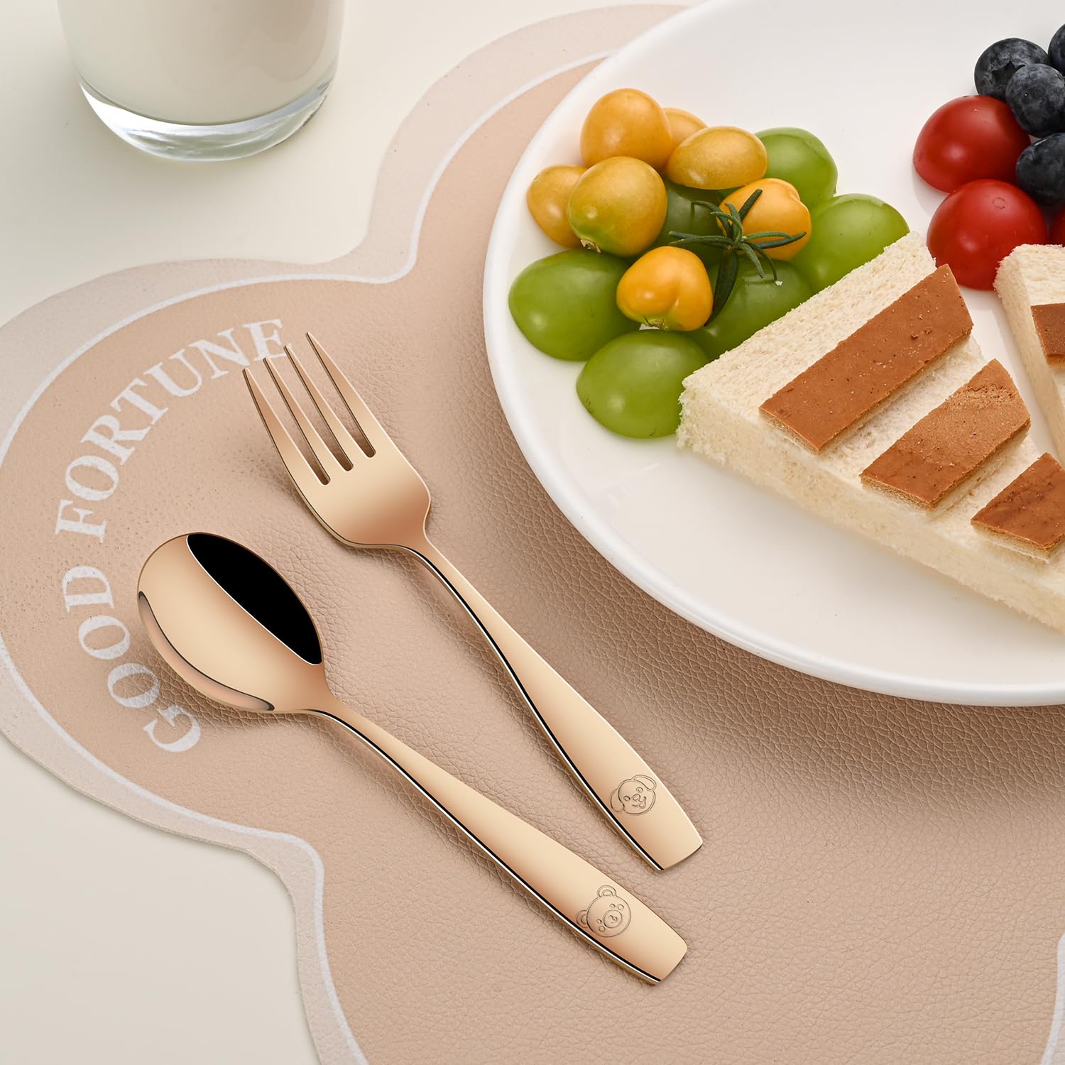 Dehov gift-ready rose gold toddler utensils set image.