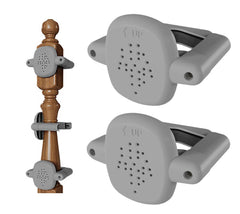 Della Stella banister adapter on round rail for damage-free gate mounting.