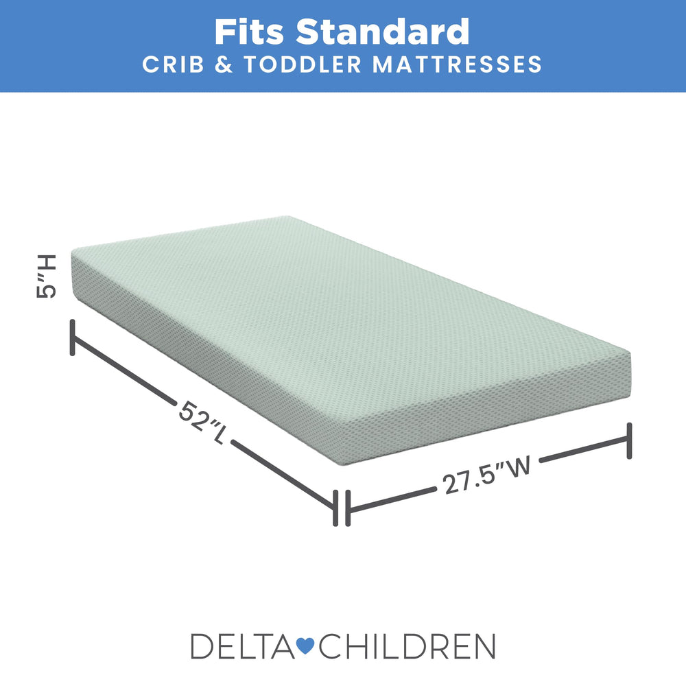 Delta Children breathable crib mattress pad cover machine washable label close-up for easy cleaning