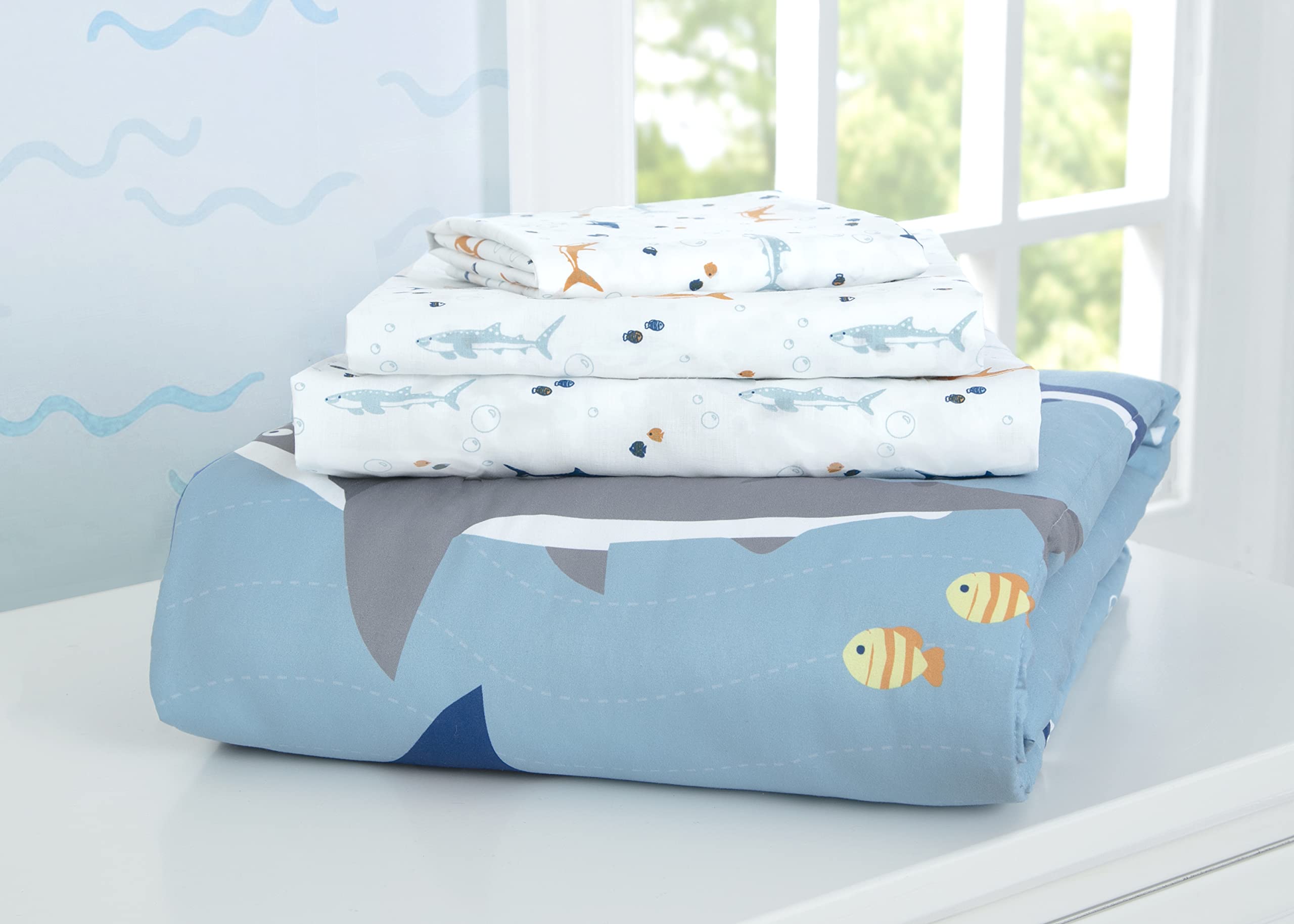 Delta Children comforter with elastic corners to reduce bunching