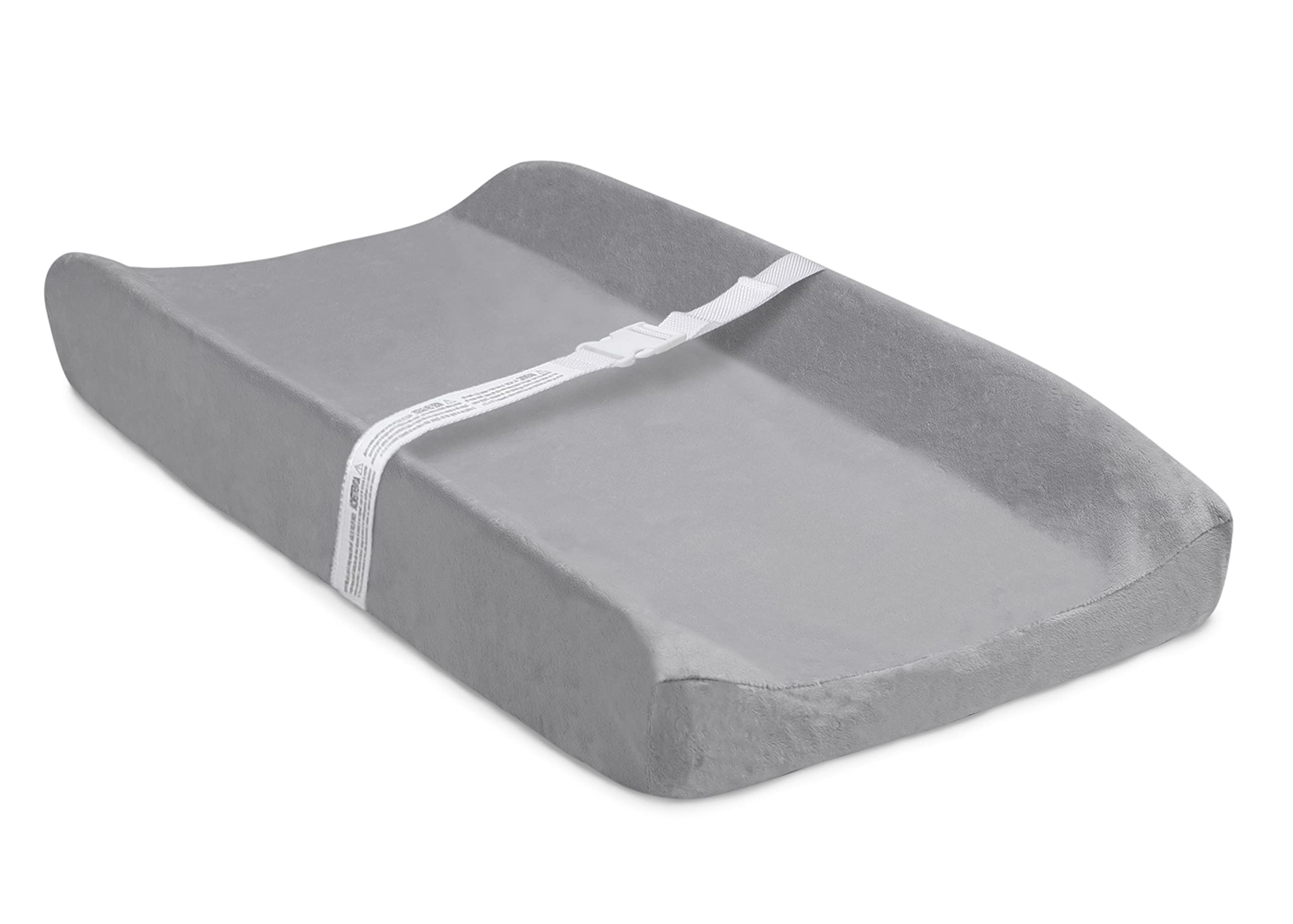 Delta Children changing pad close-up shows non-slip bottom and safety strap for security