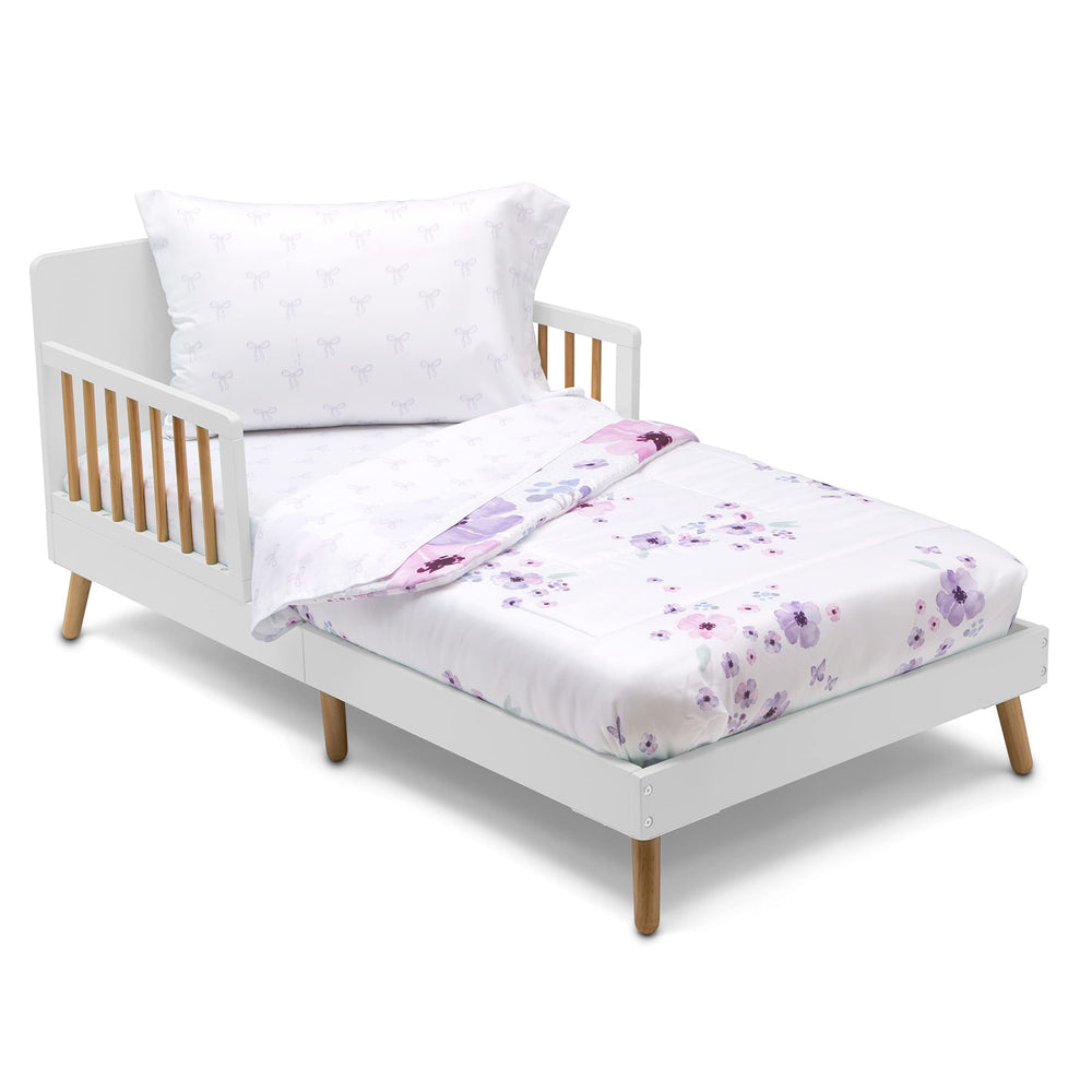 Delta Children purple bouquet comforter shows reversible design for versatile warmth