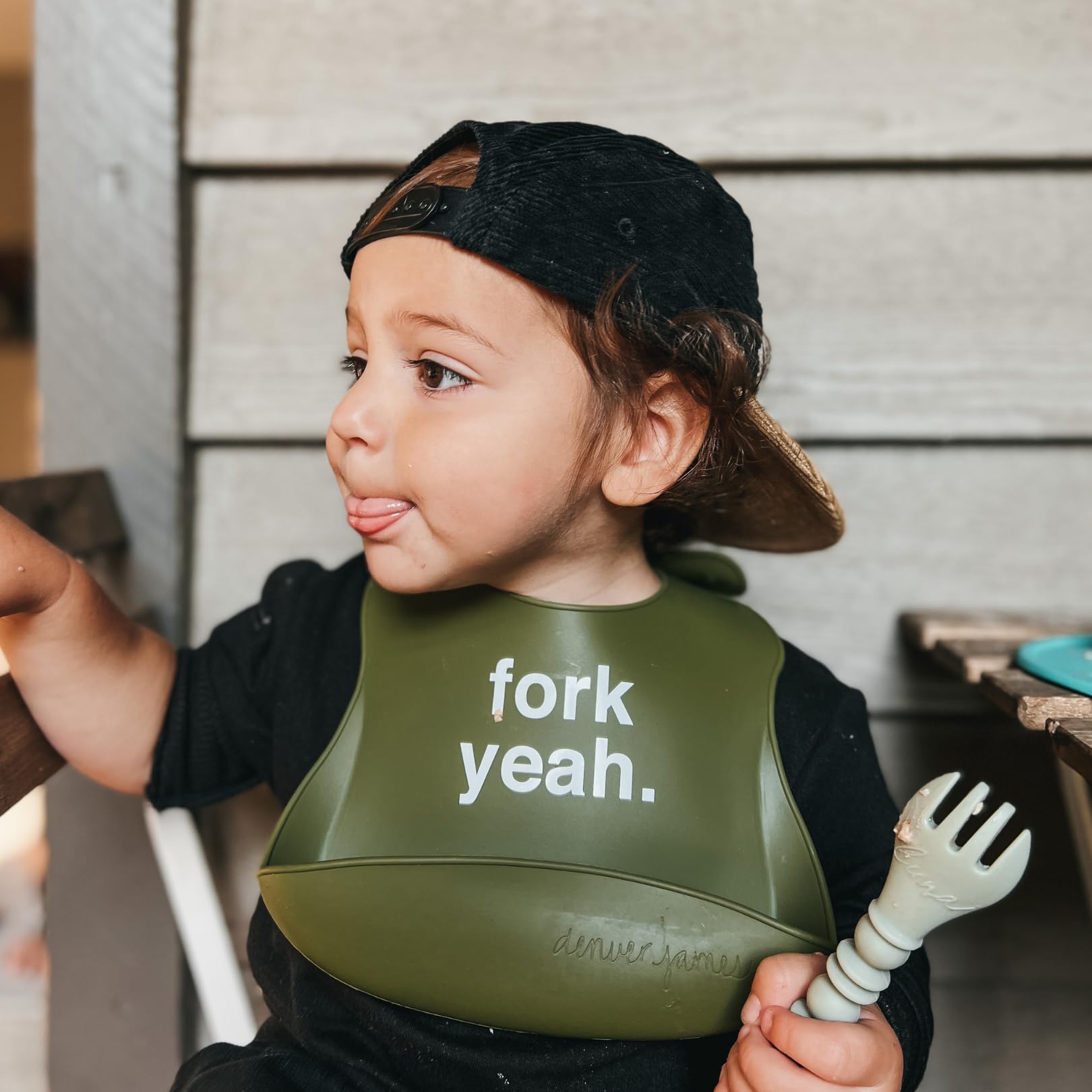 Denver James bib stain-resistant material keeps messes contained during meals.