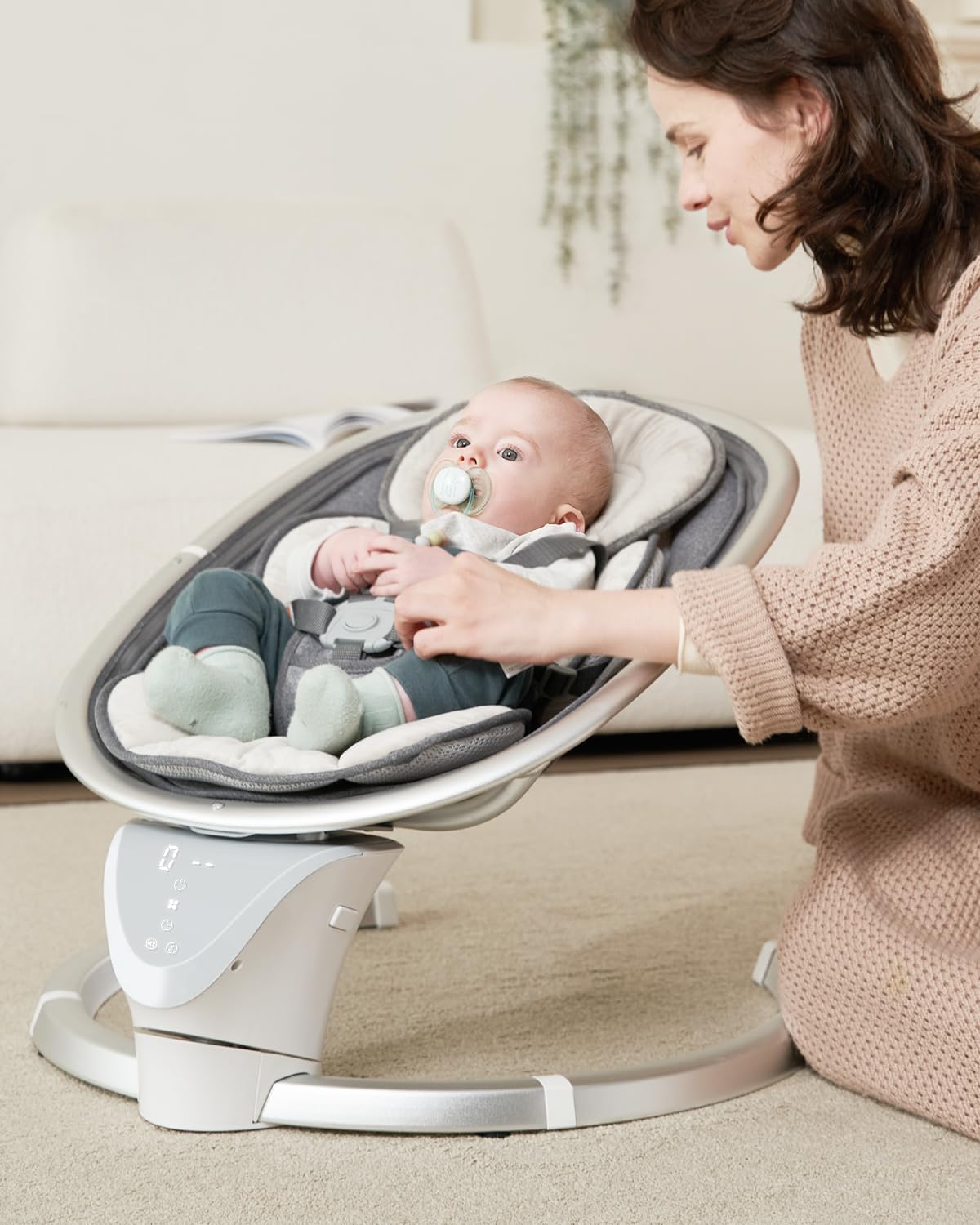 Derson electric infant swing side view showing calm motion for newborns
