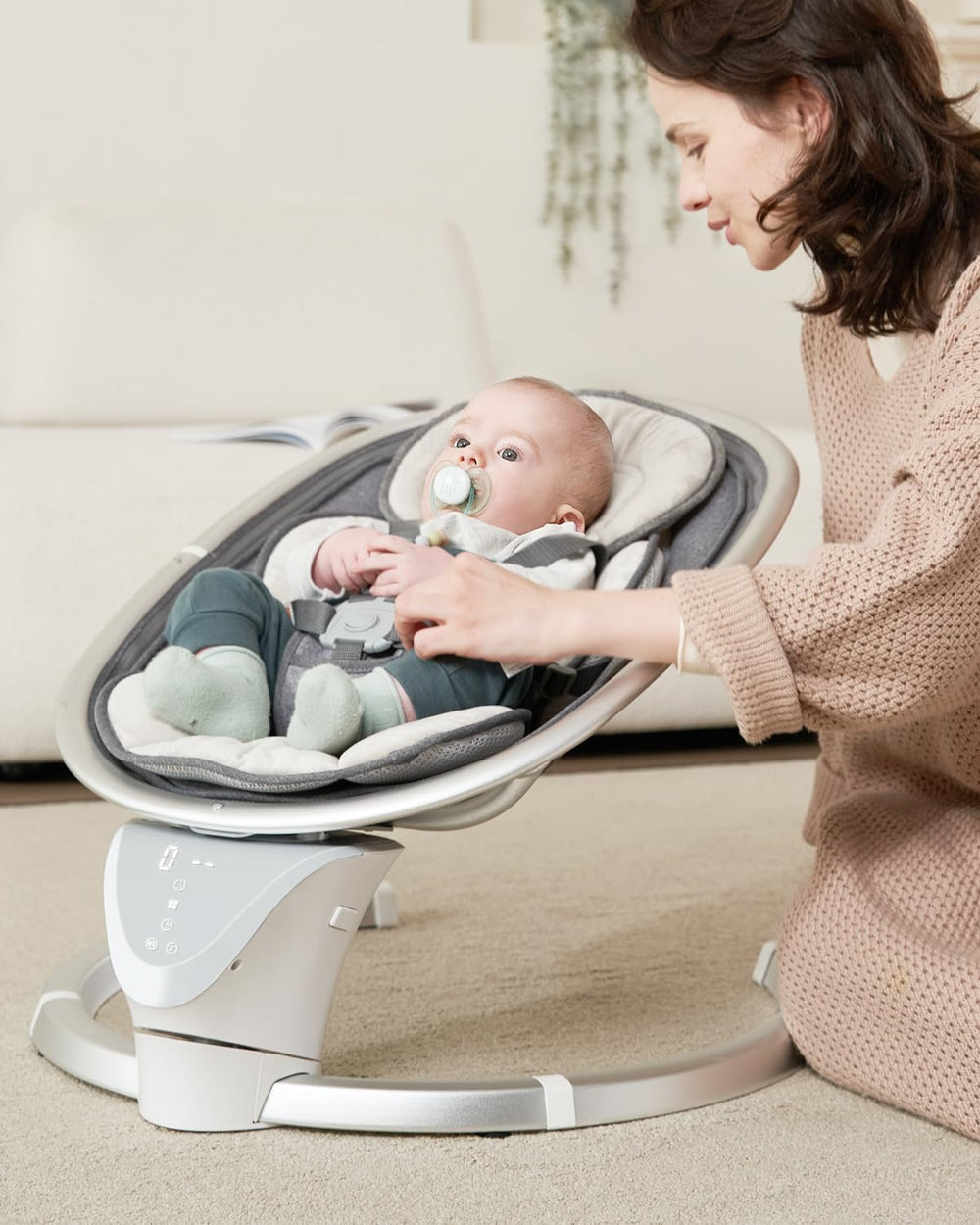 Derson electric infant swing side view showing calm motion for newborns
