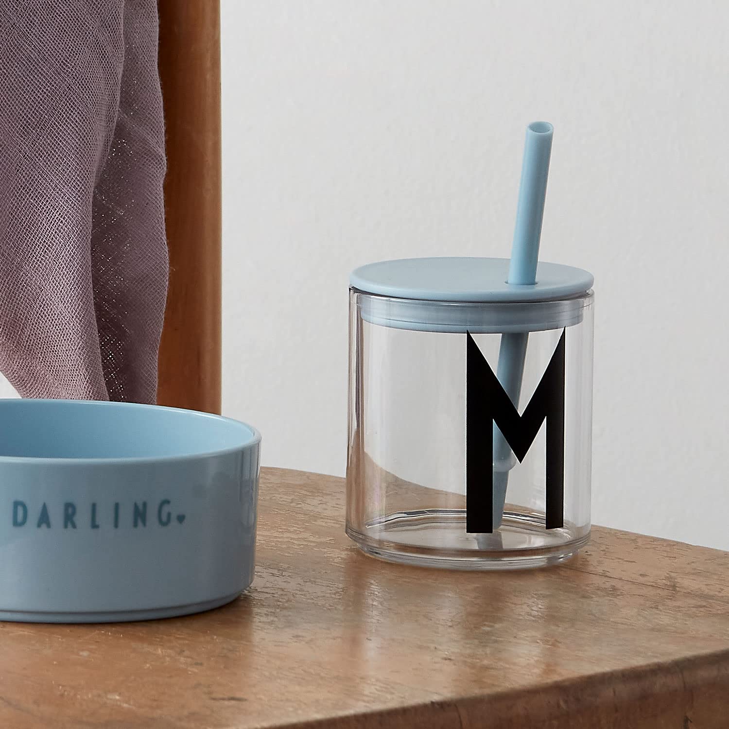 Design Letters minimalist Danish design cup blends style with practical learning at meals.