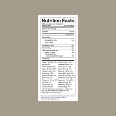 Designed by Nature Goat Milk Formula ingredients spoon highlights real-food nutrition for growing kids.