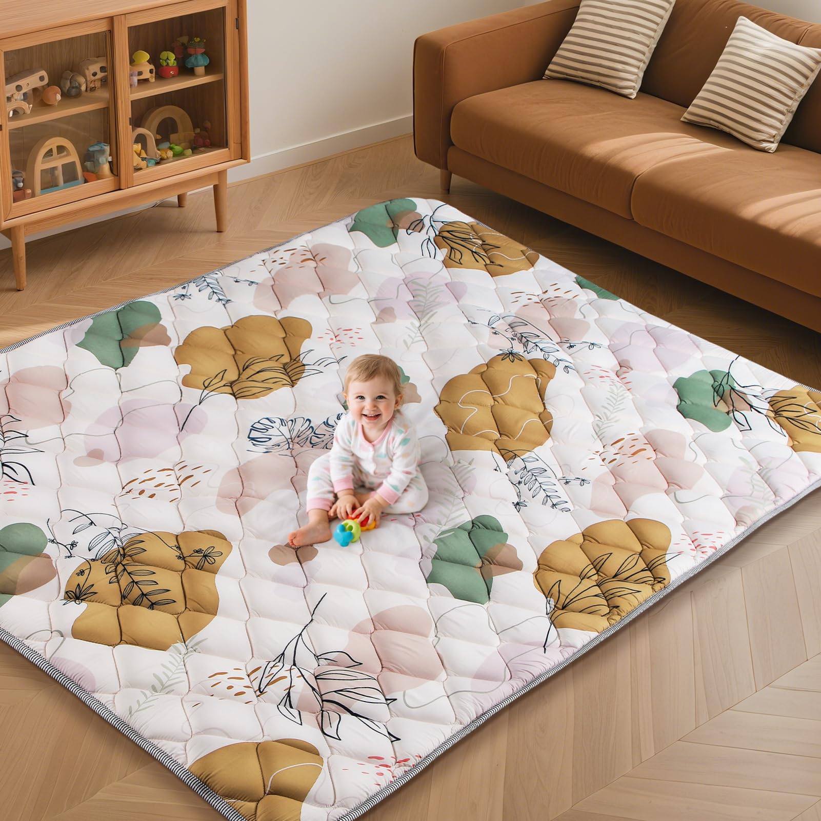 Dessports baby play mat with foam padding for comfortable tummy time.