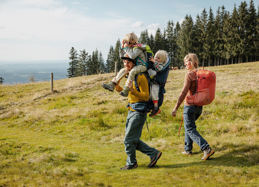 Deuter Kid Comfort front pack on a family trail adventure.