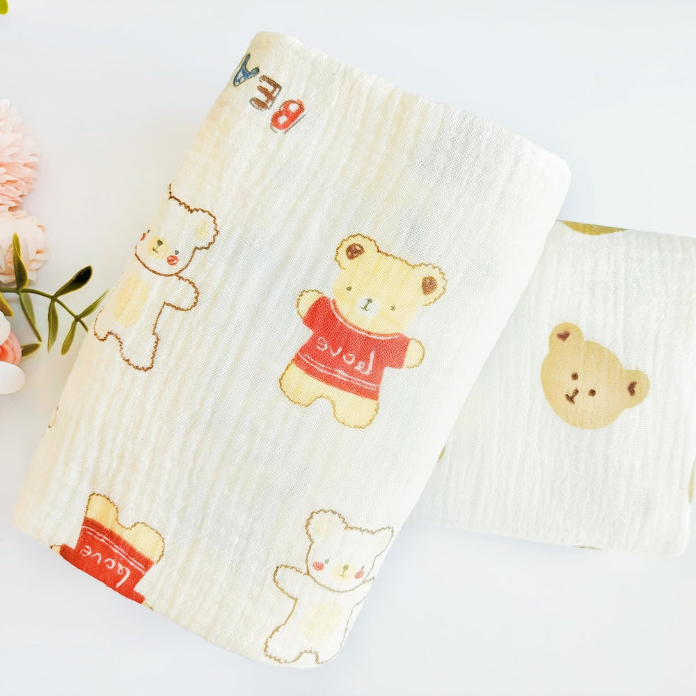 DEZIGKA muslin swaddle blanket multipurpose cover for feeding and shade.