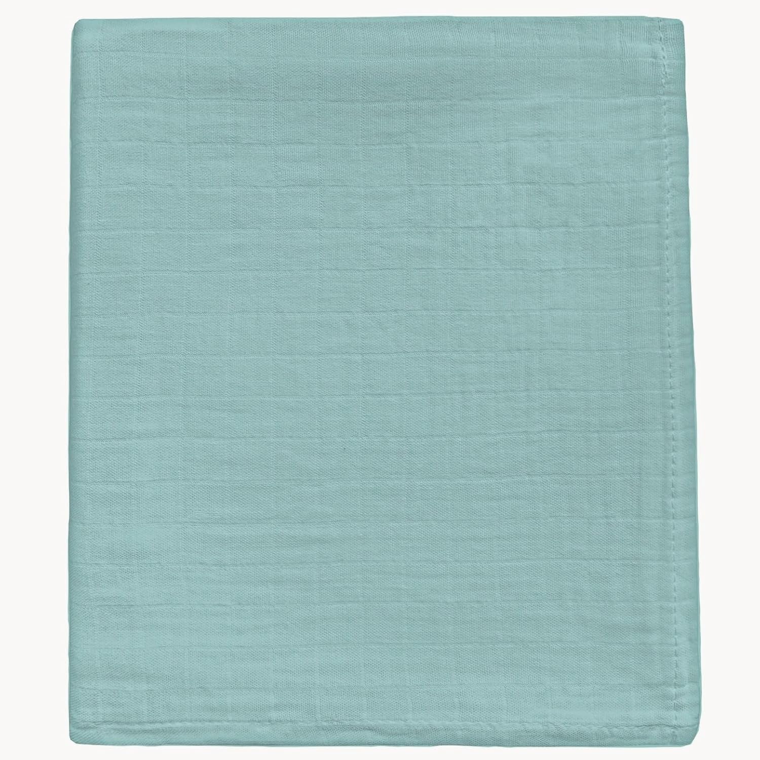 DEZIGKA muslin swaddle sage green blanket featuring soft, breathable fabric for peaceful newborn nights.