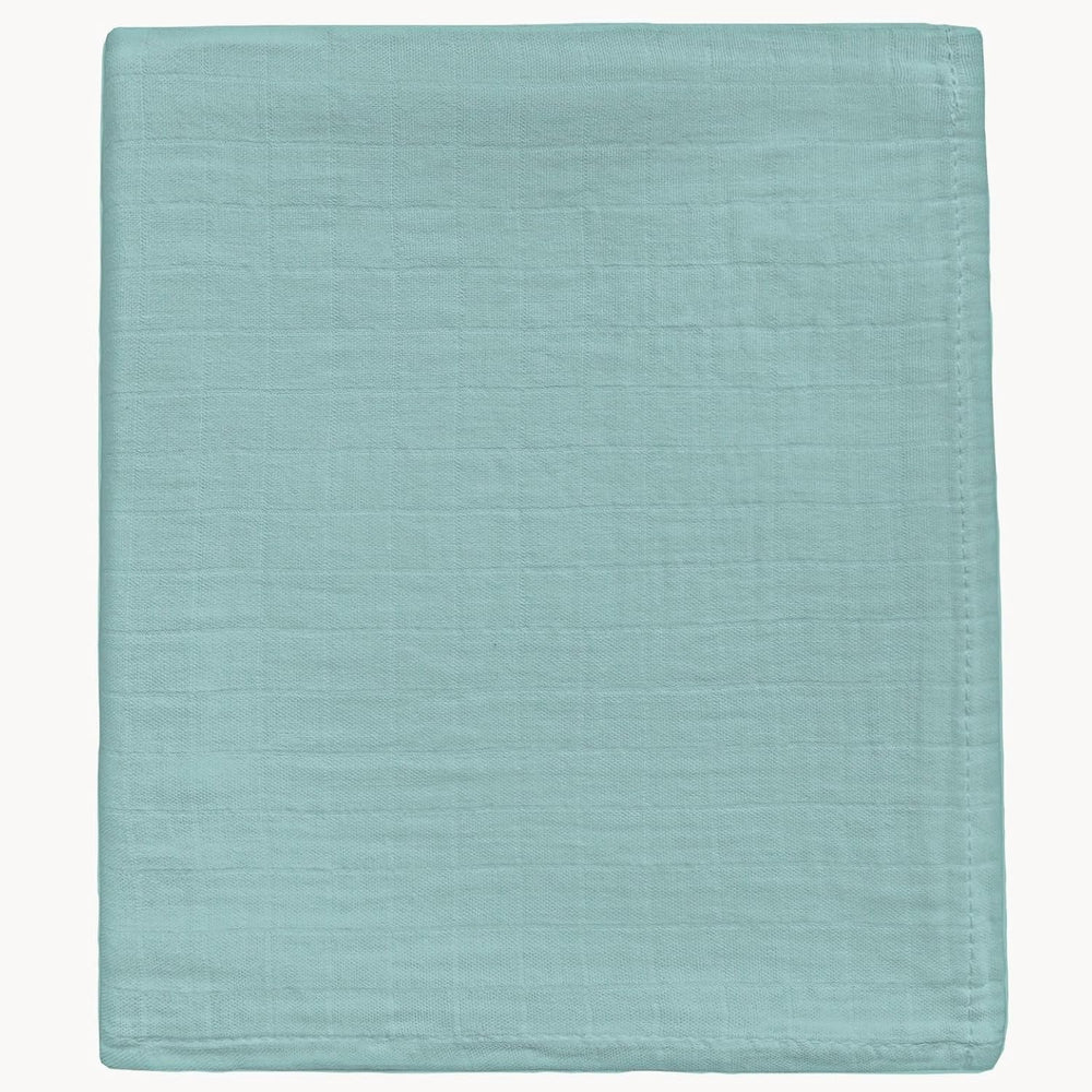 DEZIGKA muslin swaddle sage green blanket featuring soft, breathable fabric for peaceful newborn nights.