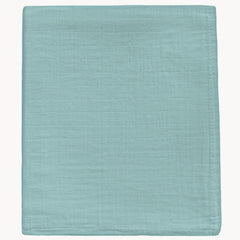 DEZIGKA muslin swaddle sage green blanket featuring soft, breathable fabric for peaceful newborn nights.
