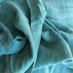 DEZIGKA muslin close-up shows high-density weave and silky texture for comfort.