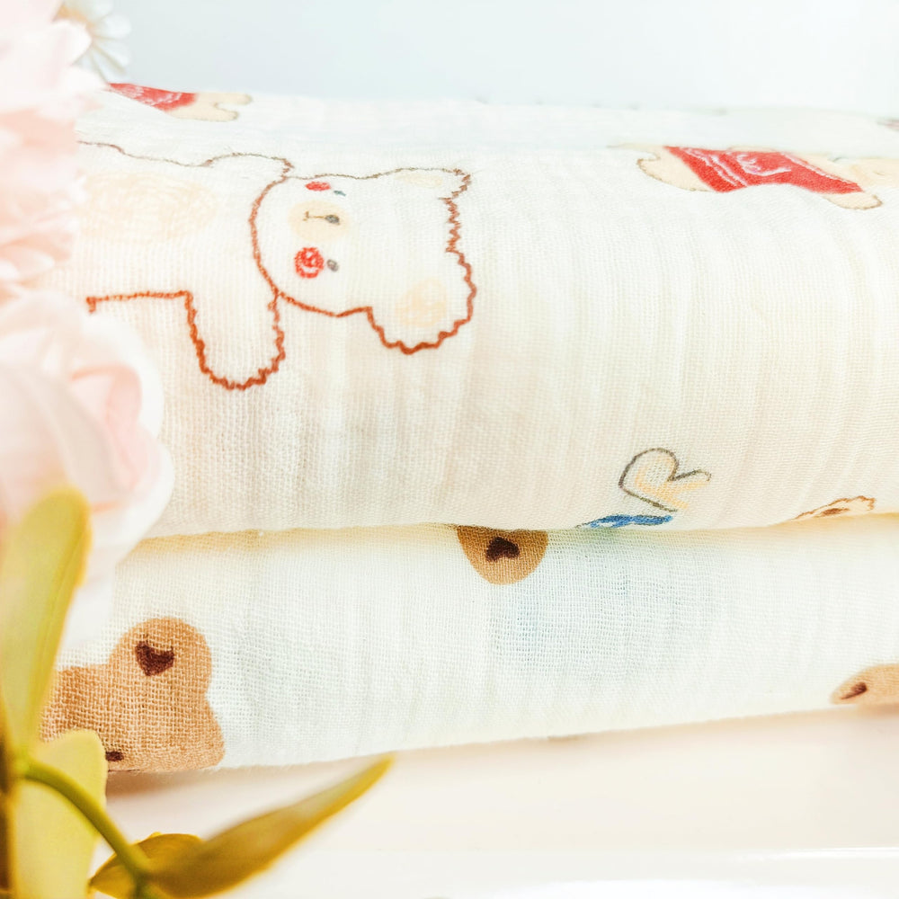 DEZIGKA muslin swaddle blanket large 40x40 inches provides versatile warmth.