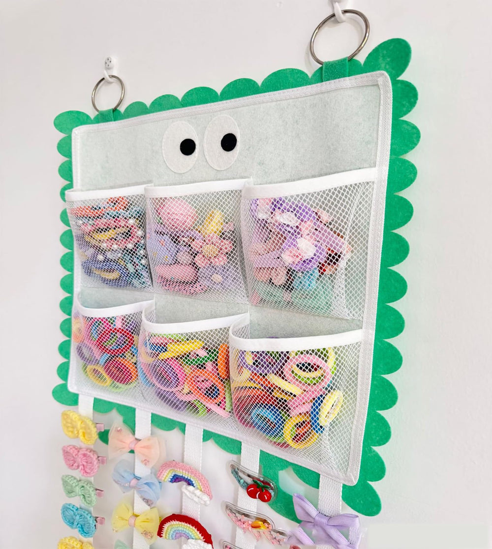 Green organizer helps keep scrunchies and clips tidy for easy styling
