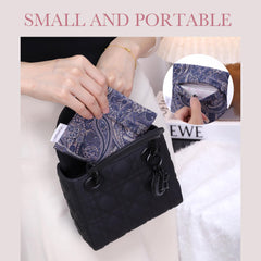 Compact period bag in blue paisley, fits napkins and liners.