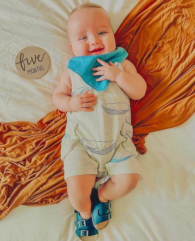 Diaper Squad baby bandana bibs showcase drool-catching designs for stylish meals.