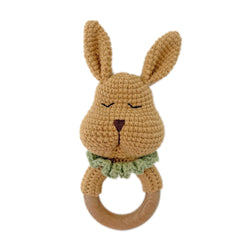 DICHA handmade crochet baby rattle with bunny design for gentle sensory play.