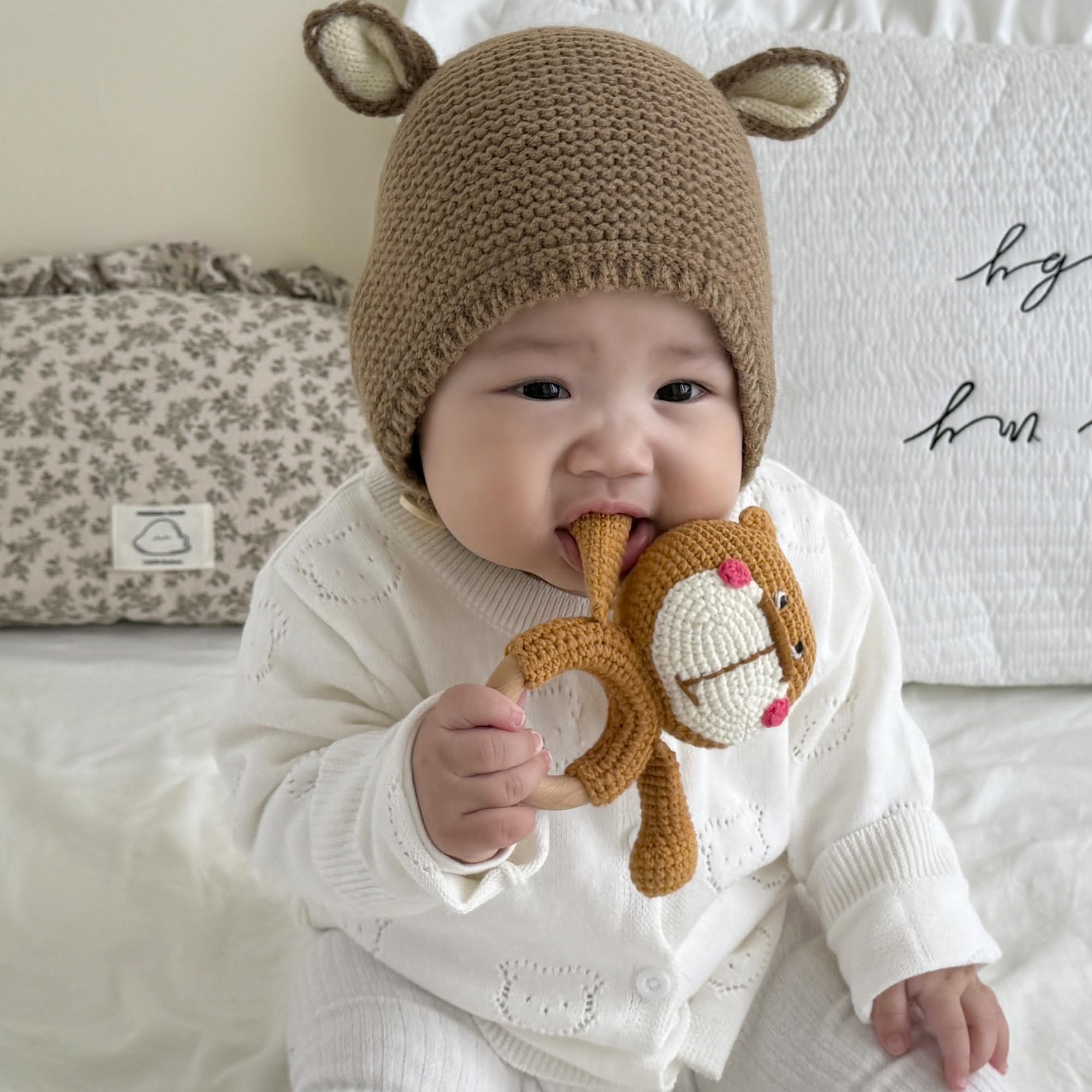 DICHA crochet baby rattle featuring plush texture for tiny hands