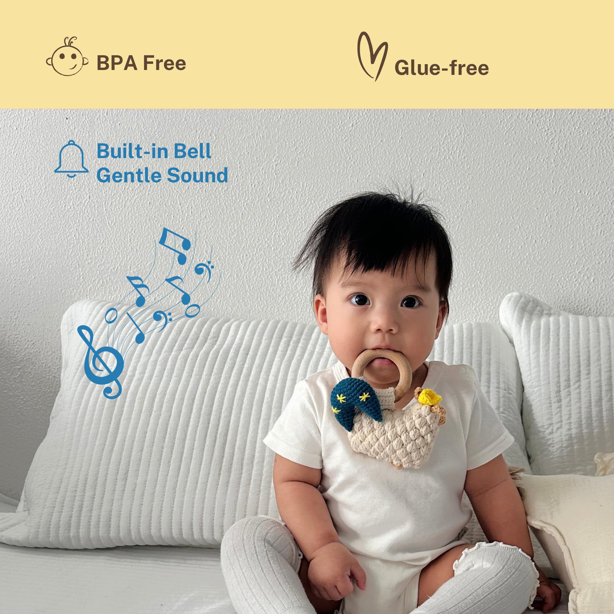 DICHA wood baby rattle with beech teething ring shown for mouthing comfort.