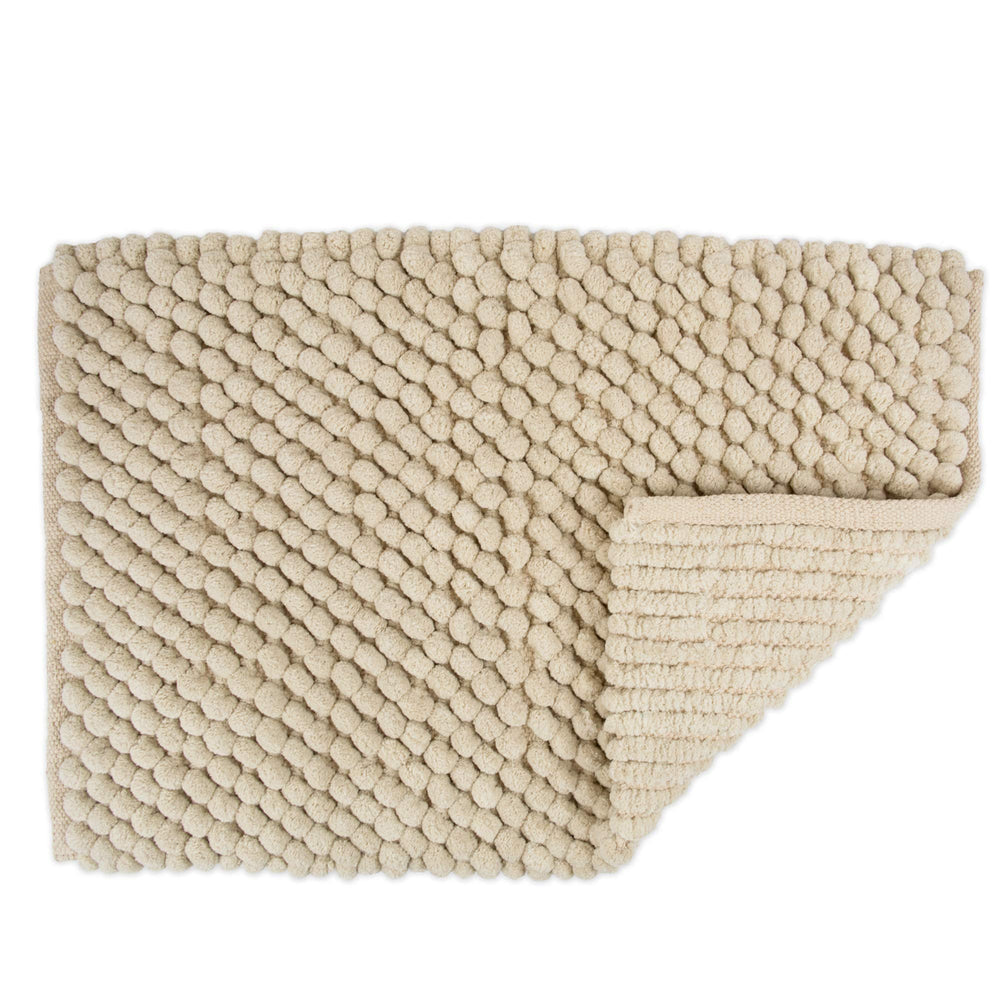 DII spa-inspired bath rug front of sink creates a coordinated look