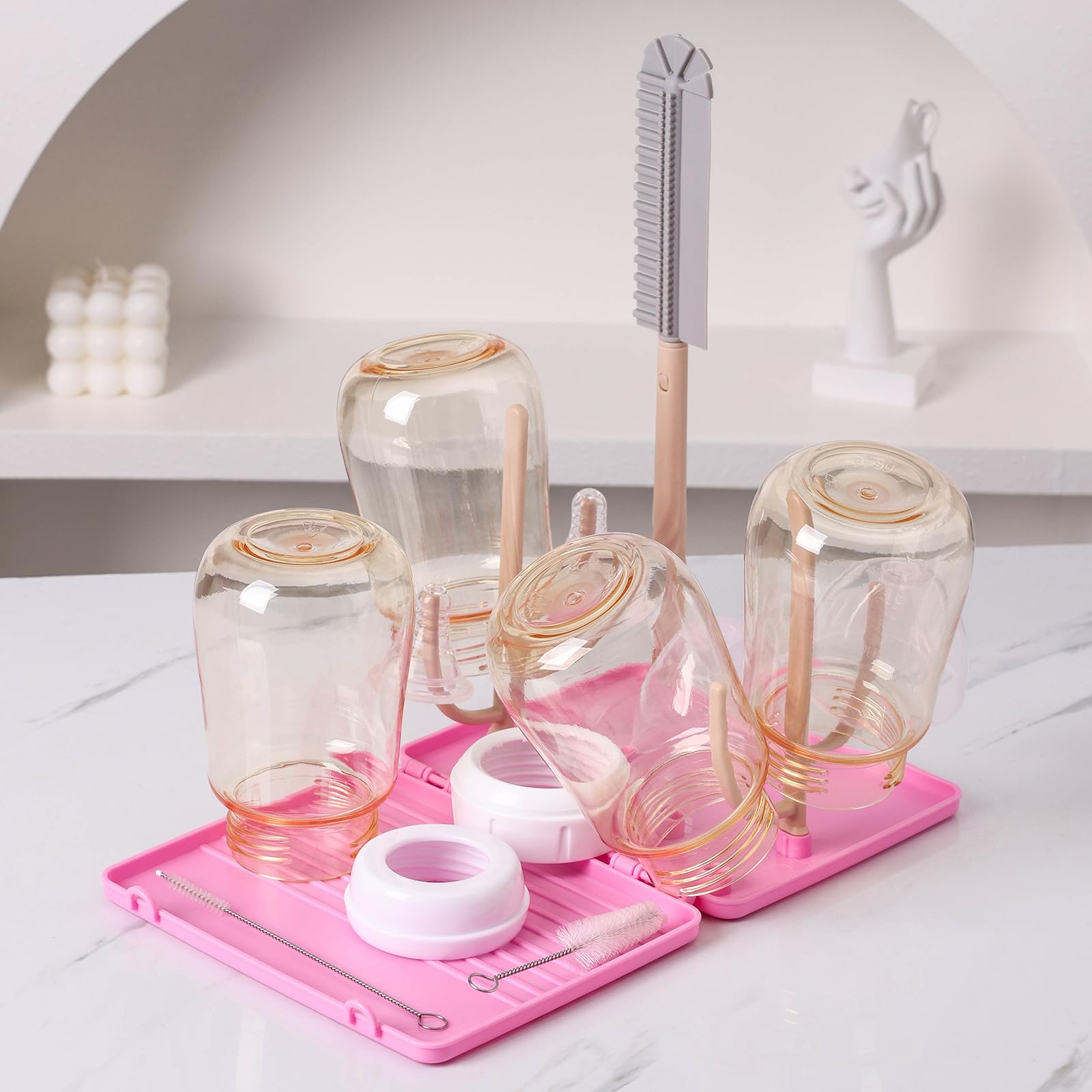 DIJIAMEIYA pink bottle drying rack for travel and home use.