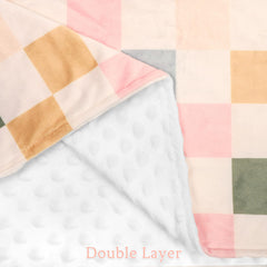 DILIMI checkered pattern blanket adds modern nursery style