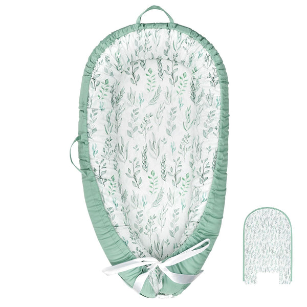 DILIMI baby lounger cover in green leaf design, gentle on skin for newborns.
