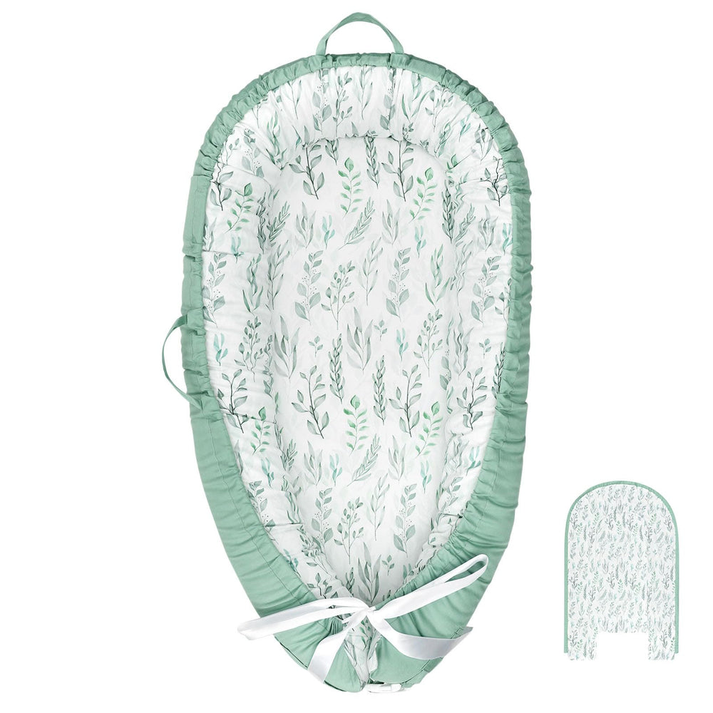 DILIMI baby lounger cover in green leaf design, gentle on skin for newborns.