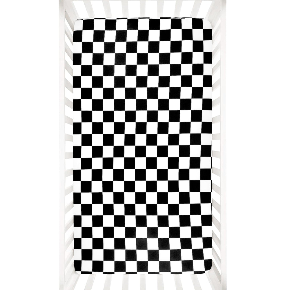 DILIMI checkerboard crib sheet close-up shows ultra-soft jersey knit for gentle baby sleep