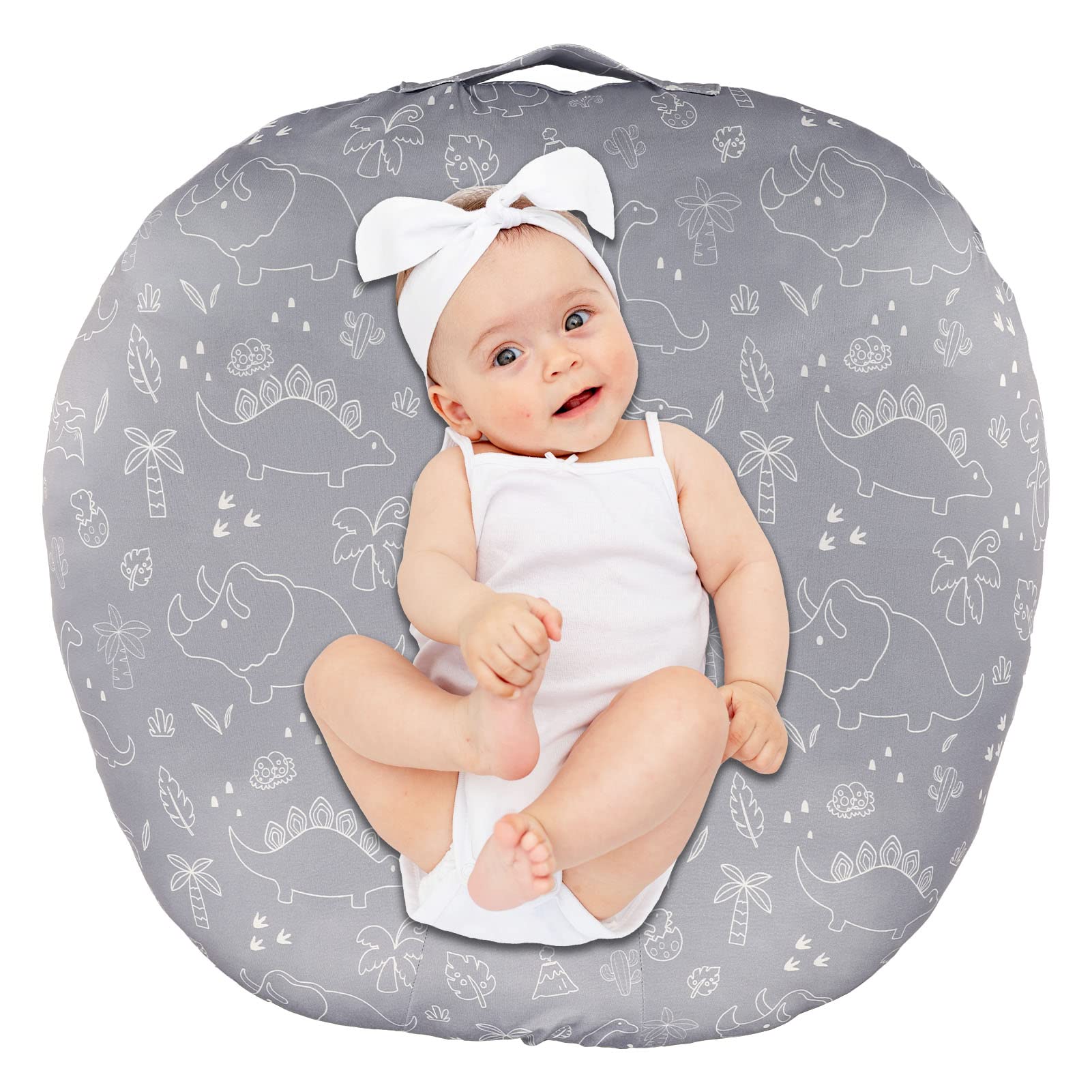 Dilimi newborn lounger cover with dinosaur pattern adds cozy nursery style.