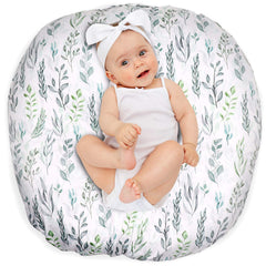 DILIMI newborn lounger cover in green leaf pattern protects the nest and adds style.