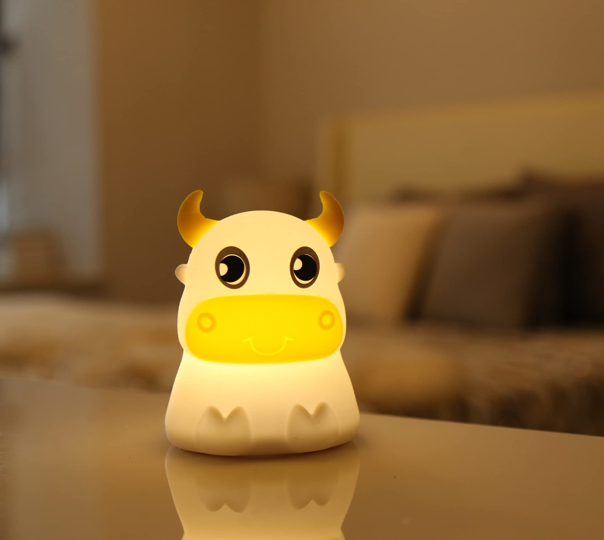 Dimanito cow night light bedside use for safe late-night checks.