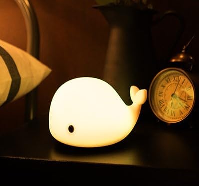 Dimanito Whale night light provides a soft, comforting bedtime glow.