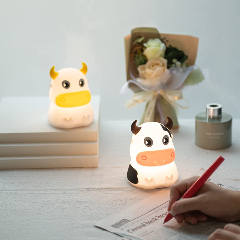Dimanito pink cow night light glows softly to soothe nursery nights