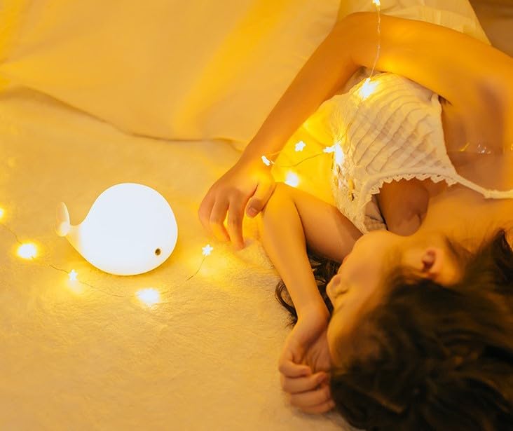 Dimanito portable nursery night light is compact for bedside or travel.