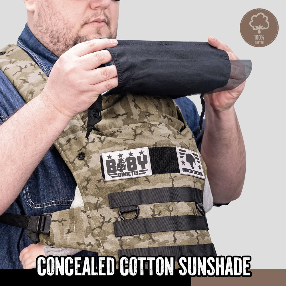 DINICTIS TACTICAL travel-ready carrier designed for infants to toddlers.