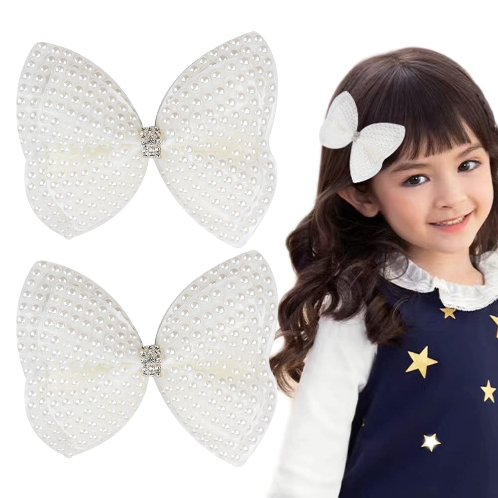 DINPREY pearl bow with rhinestones shines beautifully on little hairstyles