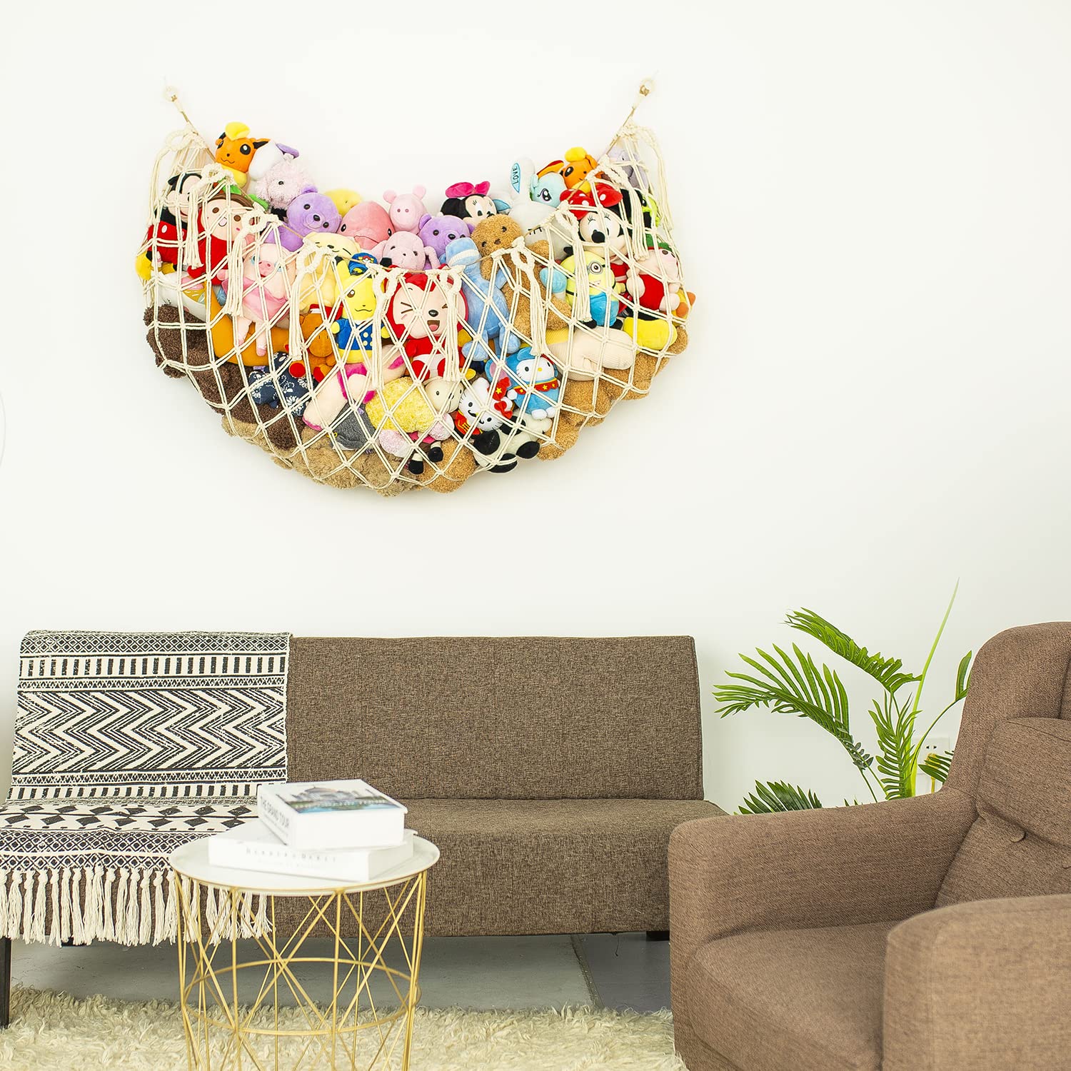 Diocos macrame toy hammock with wooden beads and tassels for decorative storage.