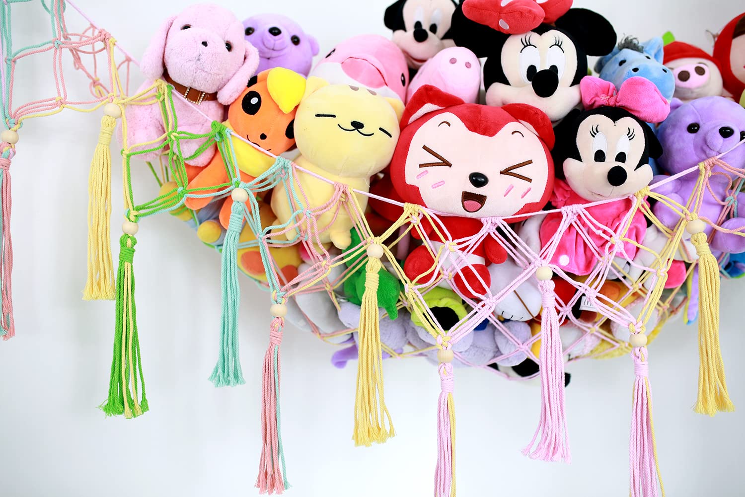 Diocos stuffed animal hammock hanging setup keeps plush friends organized and accessible.