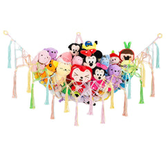 Diocos corner XL toy hammock in a child's room maximizing corner storage for plush toys.