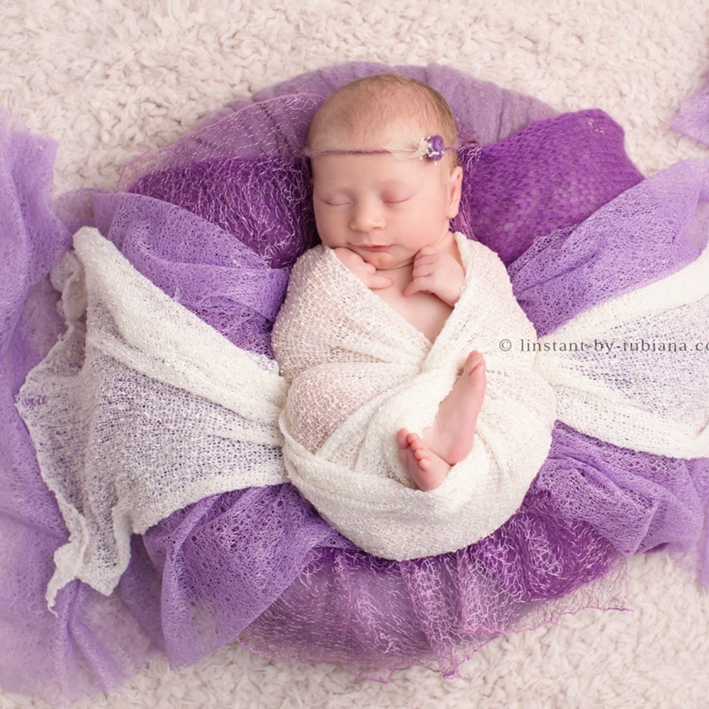 DJ DonJudy swaddle blanket soft knit with open weave.