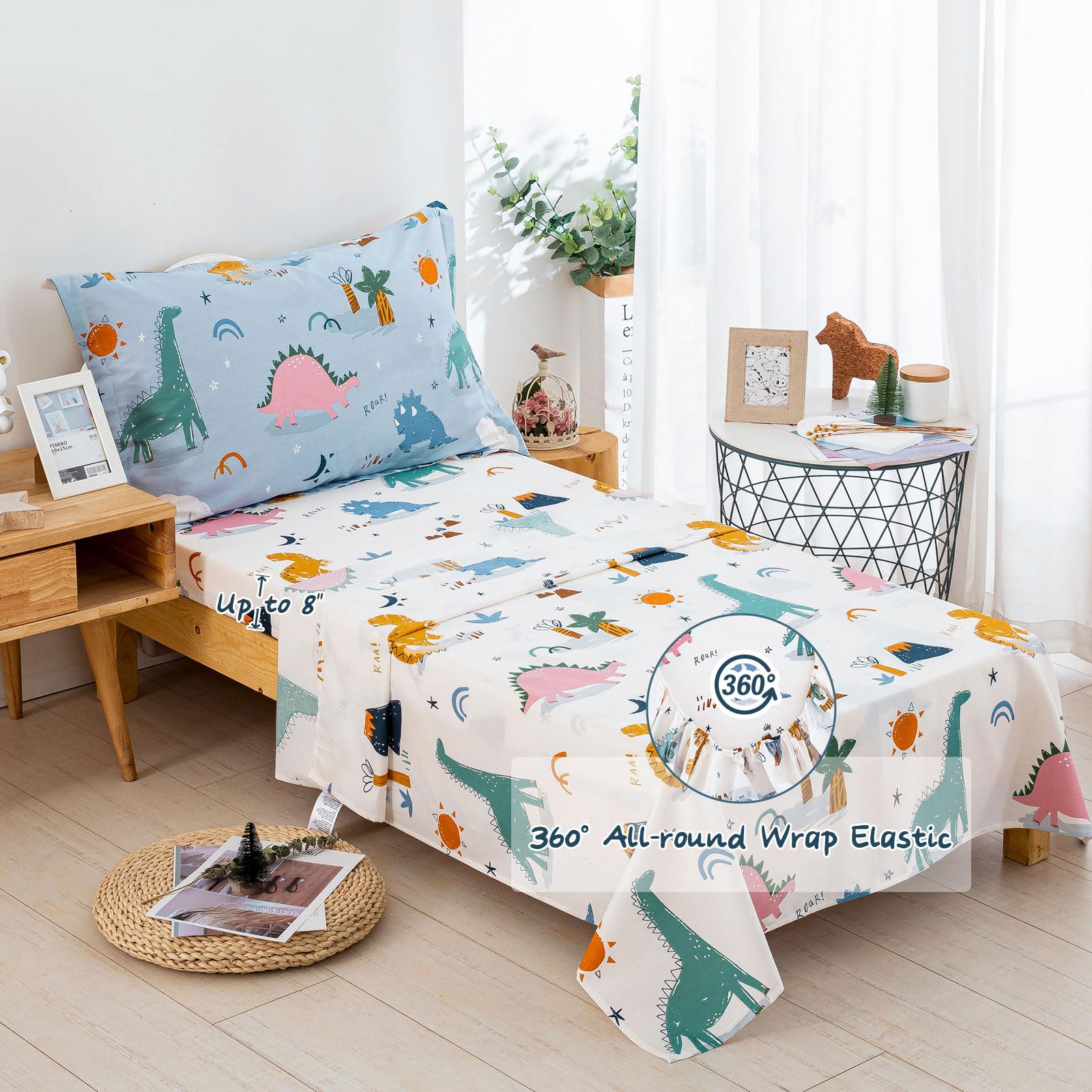 DJY bedroom scene with dinosaur toddler bedding shows playful room setup